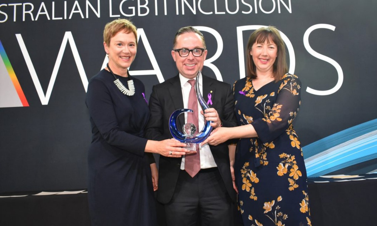 Assistant Director Student Diversity and Inclusion Lara Rafferty (L) and Organisational Development Manager Amy Love (R) pictured with Qantas CEO and Pride in Diversity co-patron Alan Joyce at the Australian LGBTI Inclusion Awards.