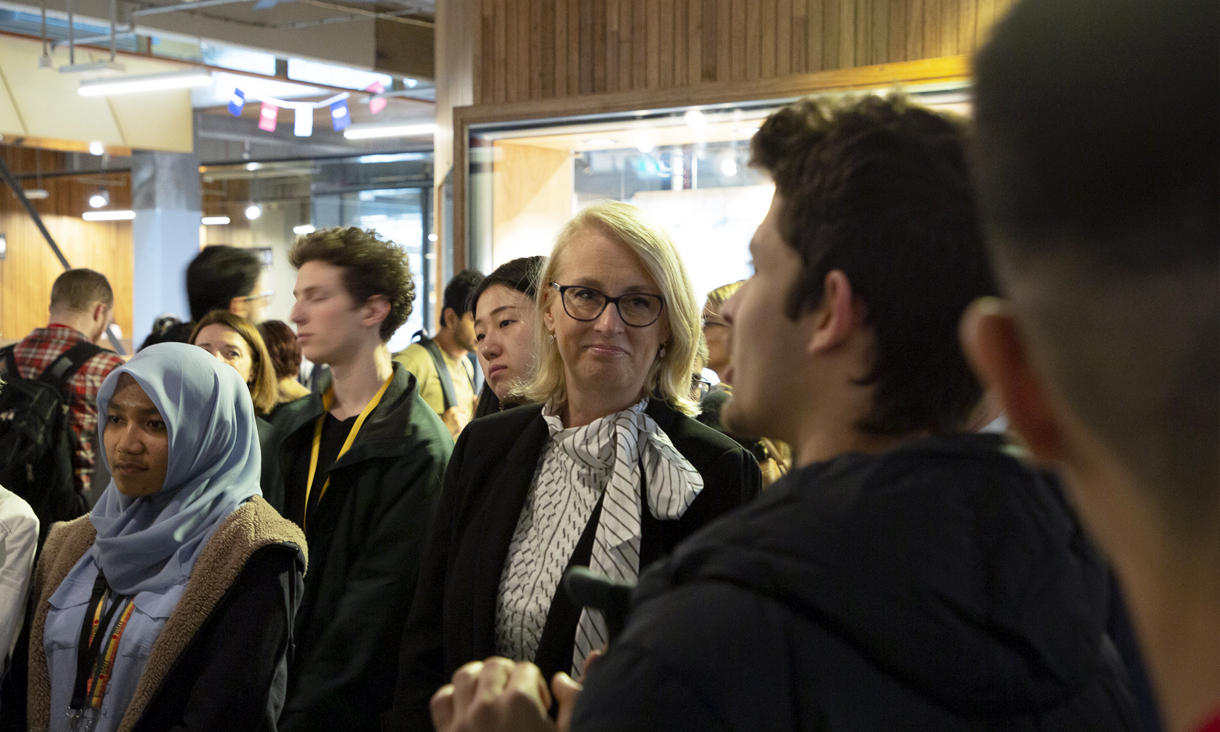 The Right Honourable Lord Mayor, Sally Capp listens to the innovative solutions students developed to reduce waste in Melbourne