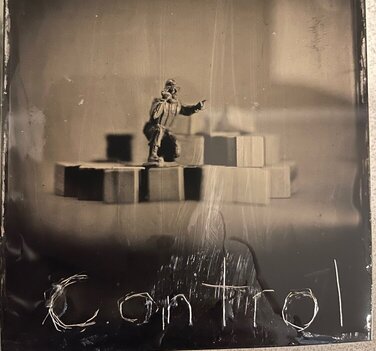 One of the fifteen wet plate collodion tintypes that make up the first work, Hall of Shadows. '