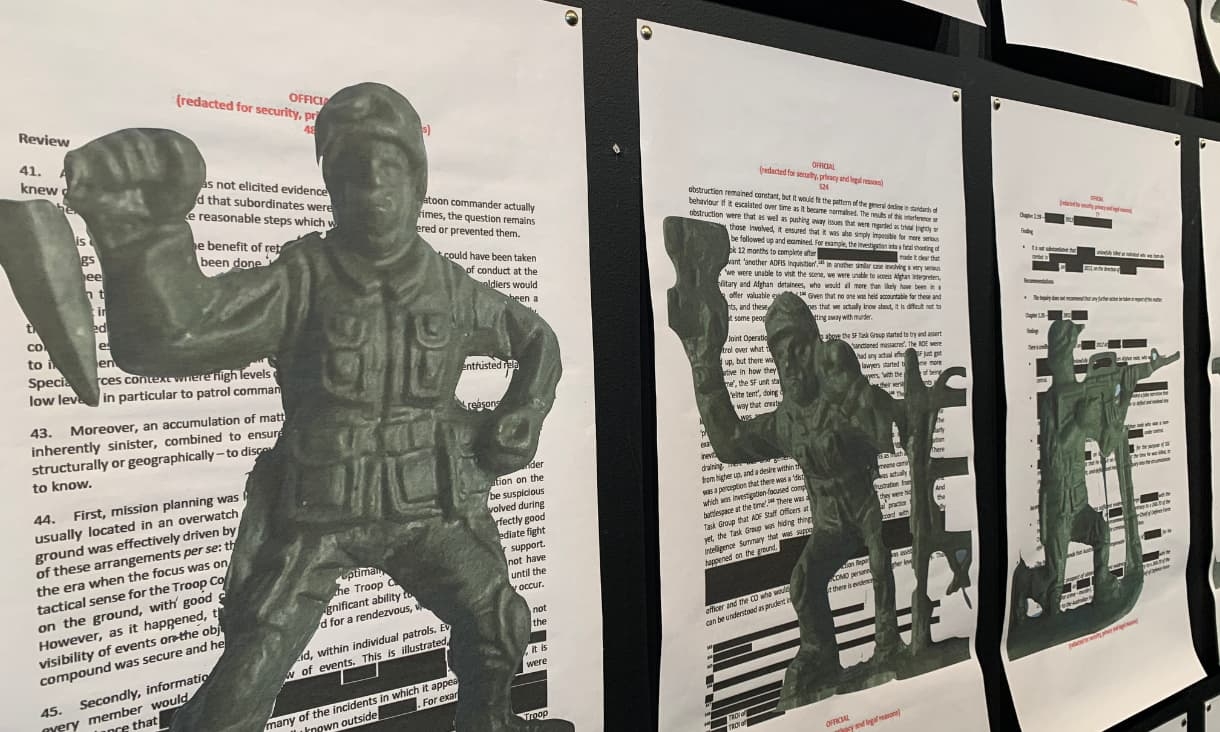 Some of the images of plastic figures overlaid onto pages of the Brereton Report.