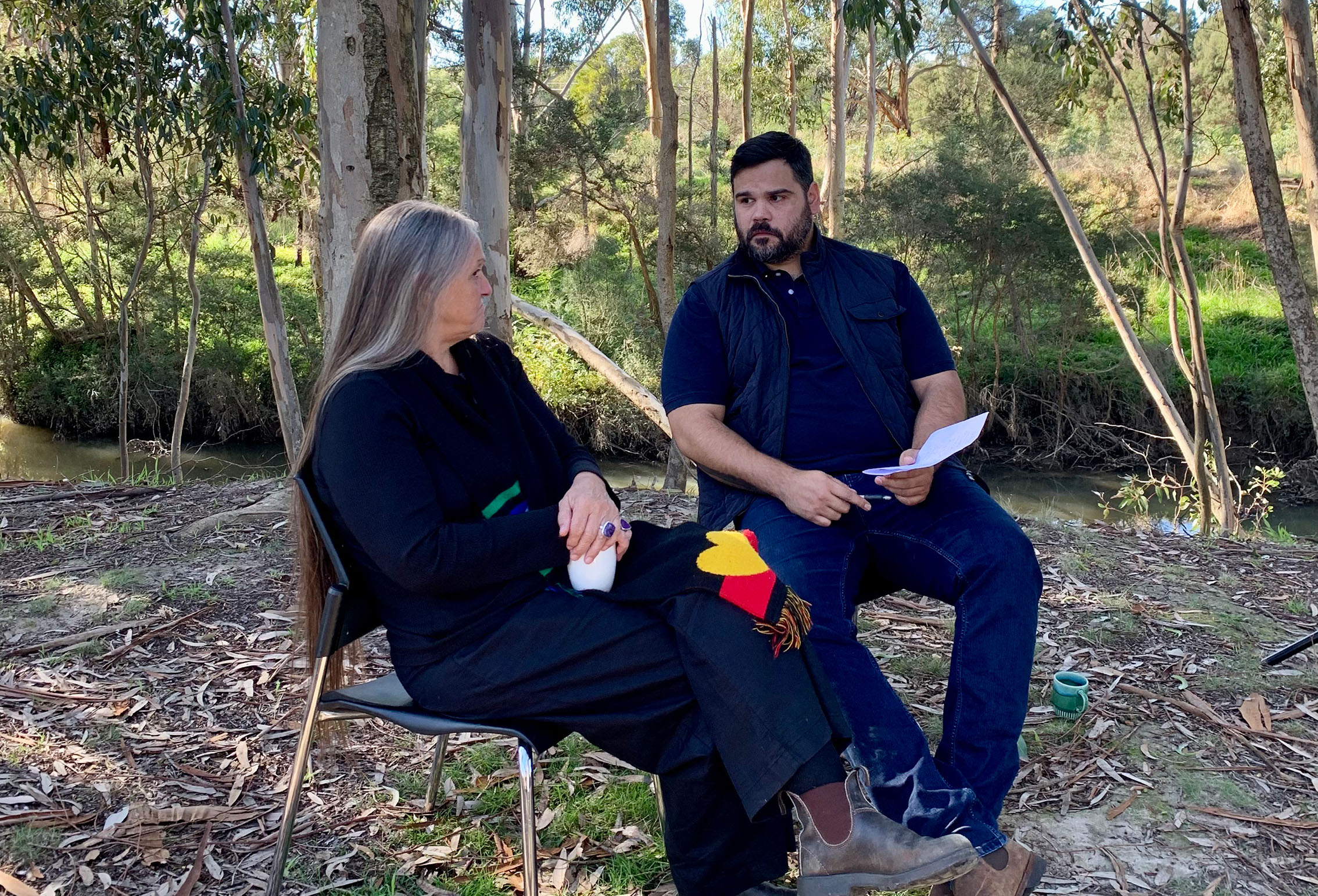 Dr Vicki Couzens and Robert Young yarning about working on Country by a creek
