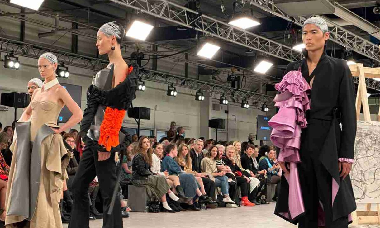 Students' winning work being showcased on the student runway