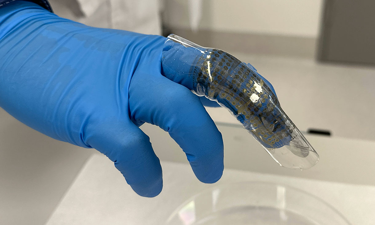 The team’s innovation features a single nanomaterial incorporated into a stretchable casing fitted to a person’s finger. Credit: Seamus Daniel, RMIT University