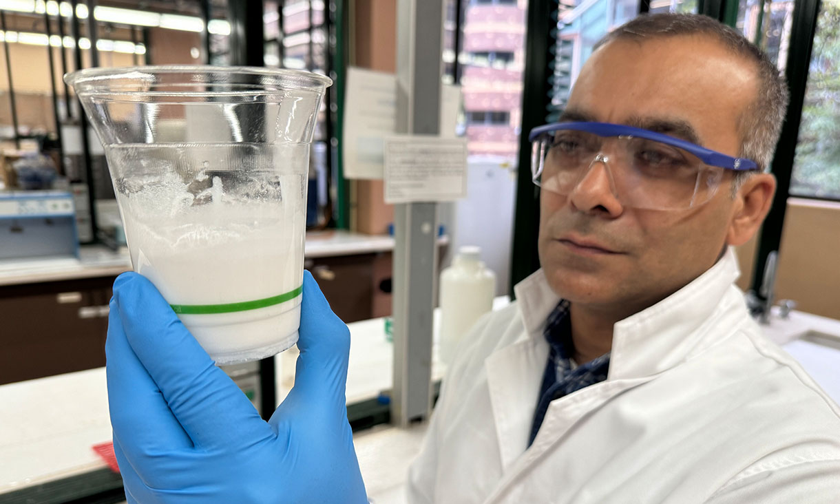 Lead researcher Dr Tariq Nazir holds a mixture of the insulation composite material that can serve as a protective coating for power pole insulators. Credit: Will Wright, RMIT University