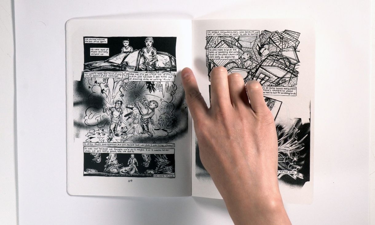 Matt Huynh, brush and ink comic artist, demonstrating one of his comics.