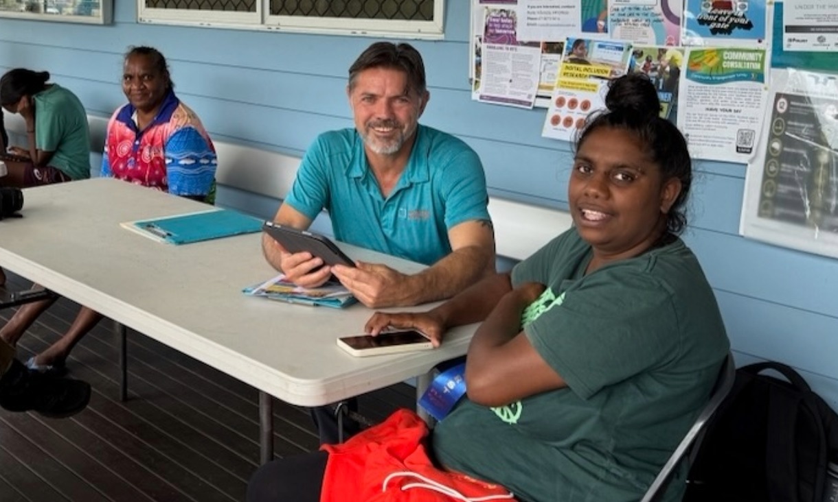 Daniel Featherstone surveying Wujal Wujal resident Alexandra Darkan.
