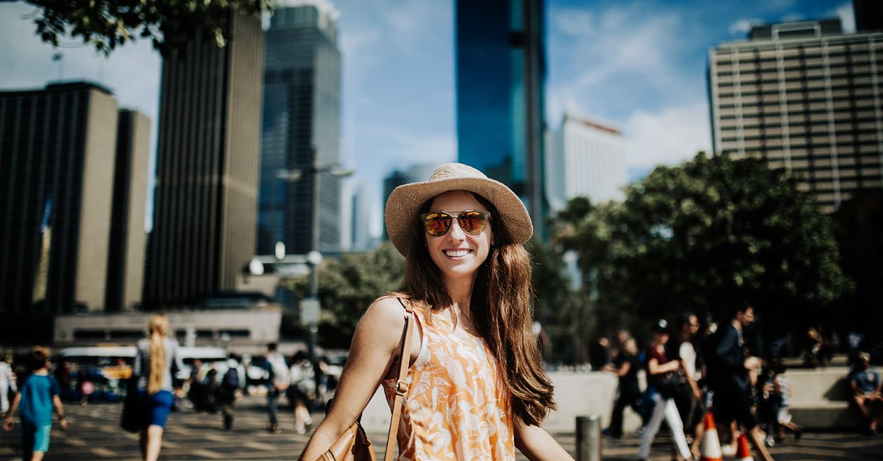 Woman in hat in city
