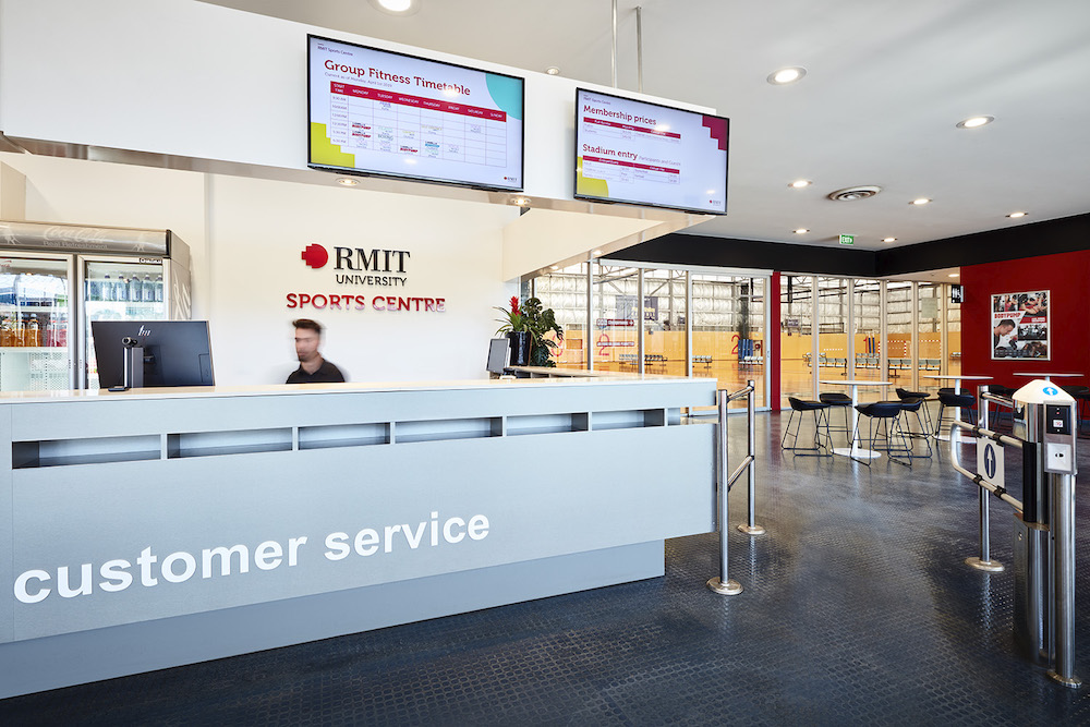 foyer of RMIT sports centre showing customer service counter